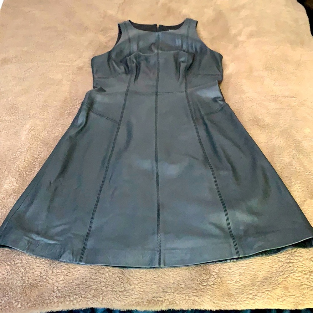 Women’s White House Black Market black genuine leather fully lined dress.